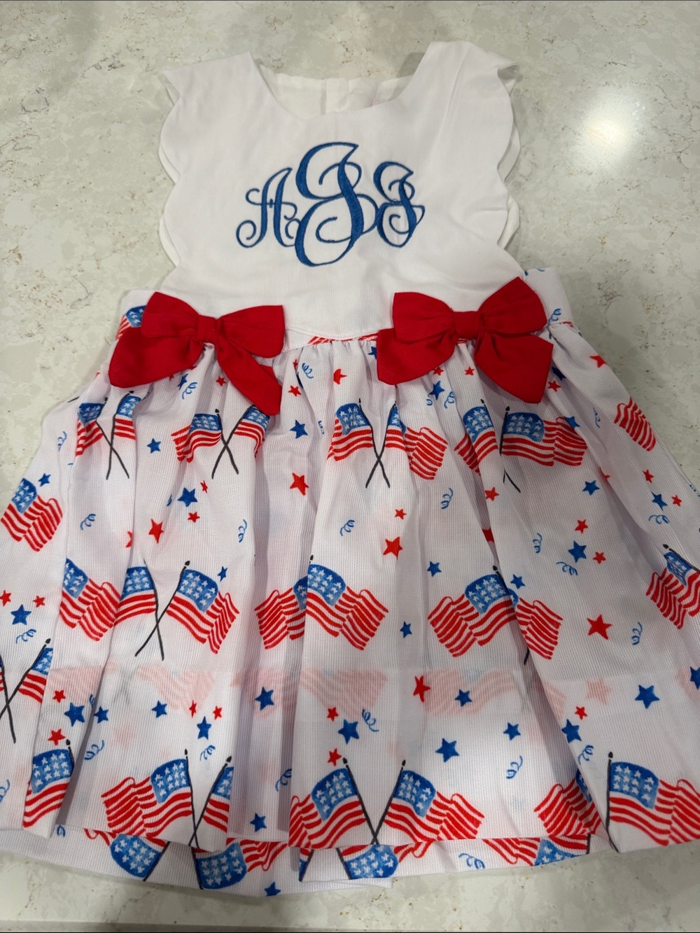 The Smocking Place Scalloped Pinafore Flag Dress with “AJJ” Monogram